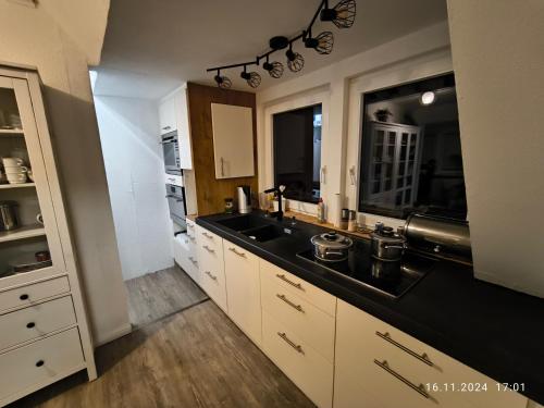 Η κουζίνα ή μικρή κουζίνα στο Appartement Blankenese 16 Kuden
