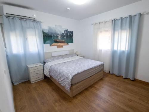 Ένα ή περισσότερα κρεβάτια σε δωμάτιο στο Casa Rustica en Las MONTAÑAS
