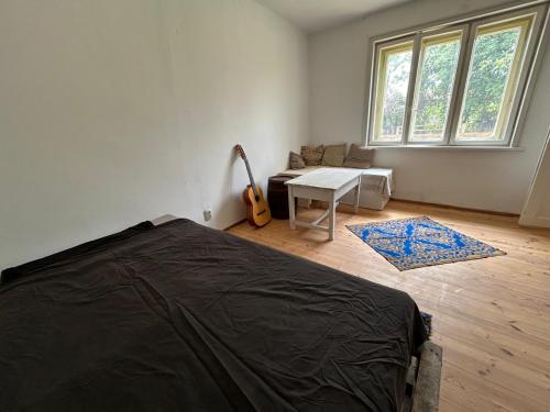 Ένα ή περισσότερα κρεβάτια σε δωμάτιο στο Gemütliches Landrefugium auf privatem Pferdehof