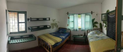 Ένα ή περισσότερα κρεβάτια σε δωμάτιο στο Viento Este Guest House