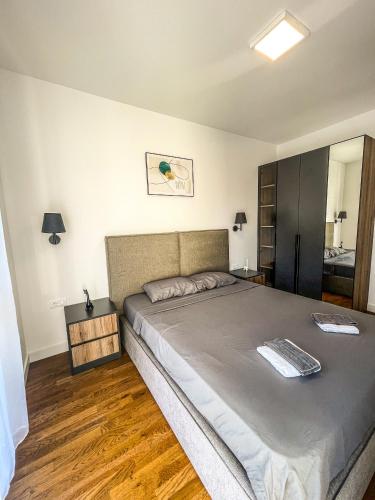 Postel nebo postele na pokoji v ubytování Soho Apartments