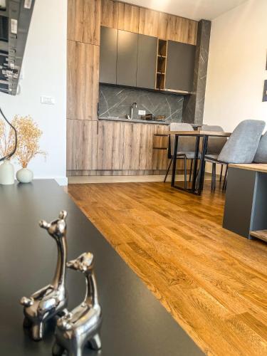 Kuchyň nebo kuchyňský kout v ubytování Soho Apartments