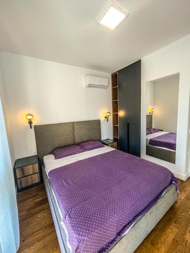 Postel nebo postele na pokoji v ubytování Soho Apartments