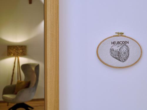 a sign on the door of a room at Moierhof in Gstadt am Chiemsee