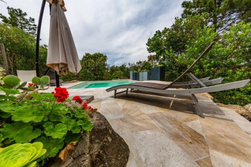 Swimmingpoolen hos eller tæt på Le Cabanon by Pinarello Villa Services