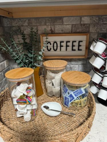 a table with a basket with coffee and a sign at Beautiful house with jacuzzi near AnnaMariaIsland in Bradenton