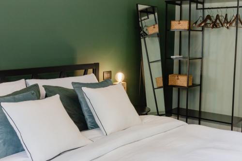 Letto o letti in una camera di Casa Patrizia Charme B&b