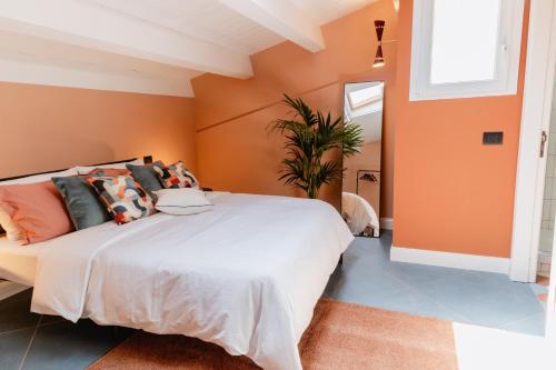 Letto o letti in una camera di Casa Patrizia Charme B&b