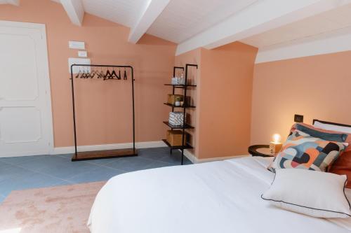 Letto o letti in una camera di Casa Patrizia Charme B&b