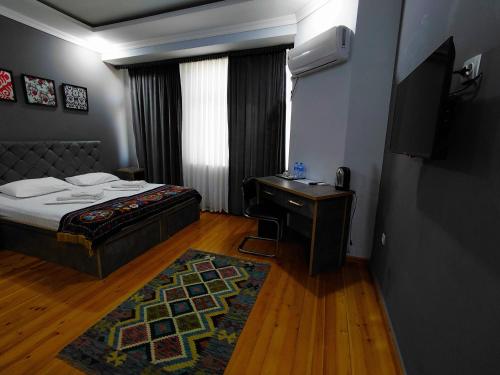 Ένα ή περισσότερα κρεβάτια σε δωμάτιο στο The Art Hotel