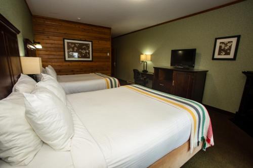 Postel nebo postele na pokoji v ubytování Oakwood Resort