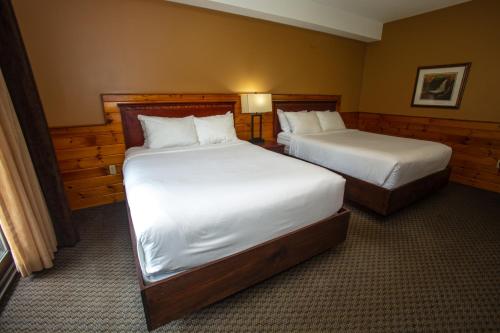 Postel nebo postele na pokoji v ubytování Oakwood Resort