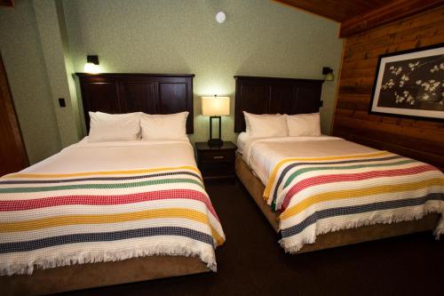 Postel nebo postele na pokoji v ubytování Oakwood Resort