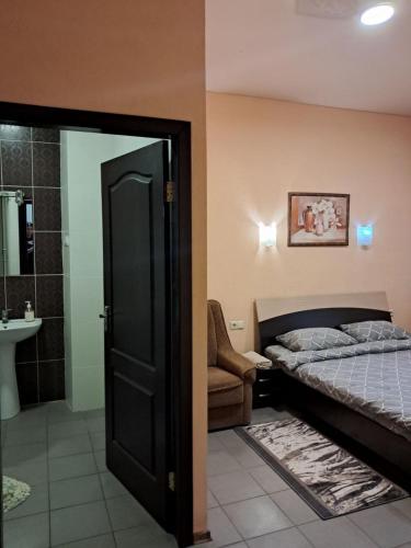Postel nebo postele na pokoji v ubytování Brave Centr apartment