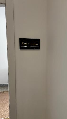 a sign on the side of a door with the words stay alive at La Corte di Partenope Luxury Suite in Naples