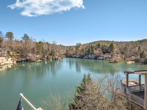 a view of a lake with houses and trees at Lakefront House In A Quiet Cove - Kayaks Available in Lake Lure