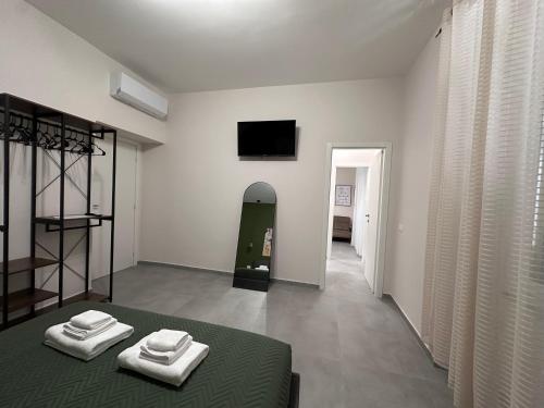 TV a/nebo společenská místnost v ubytování Casa di Priam