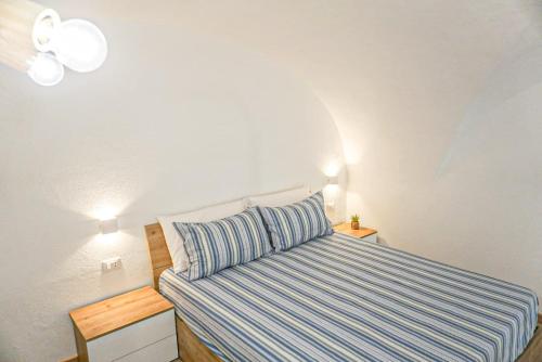 Letto o letti in una camera di Carmelitani Loft Catania Center