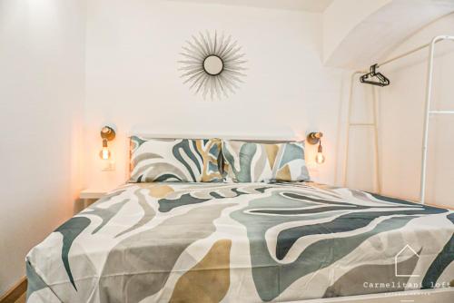 Letto o letti in una camera di Carmelitani Loft Catania Center