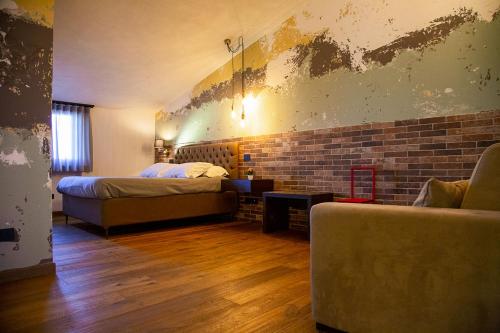 Posteľ alebo postele v izbe v ubytovaní MANTRA Suite&Rooms