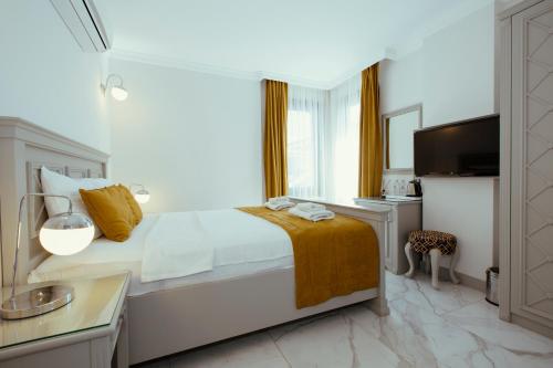 Postel nebo postele na pokoji v ubytování Cunda Say Resort
