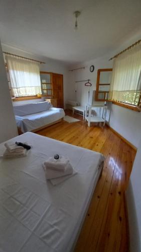 Postel nebo postele na pokoji v ubytování Mare Monte Kazaviti