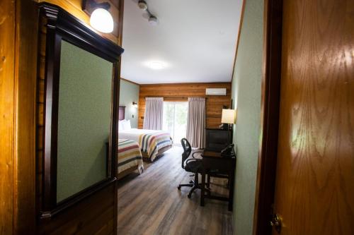 Postel nebo postele na pokoji v ubytování Oakwood Resort