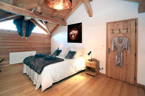 Ένα ή περισσότερα κρεβάτια σε δωμάτιο στο Superbe Chalet 250m2 Luxe Vue panoramique