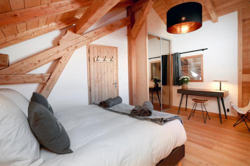 Ένα ή περισσότερα κρεβάτια σε δωμάτιο στο Superbe Chalet 250m2 Luxe Vue panoramique