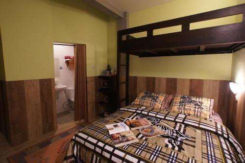 Кровать или кровати в номере Oasis Studio Hotel Satu Yogyakarta
