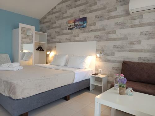 Postel nebo postele na pokoji v ubytování Simada Blue Guesthouse