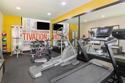 a gym with cardio machines and a treadmill at Best Western Plus Regency Park in Walker