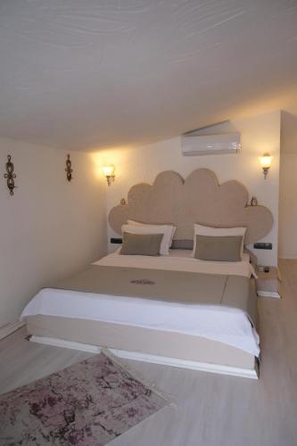 Katil atau katil-katil dalam bilik di TekHan Alacati Hotel