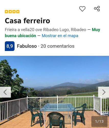 a picture of a table and chairs on a balcony at Casa ferreiro in Ribadeo