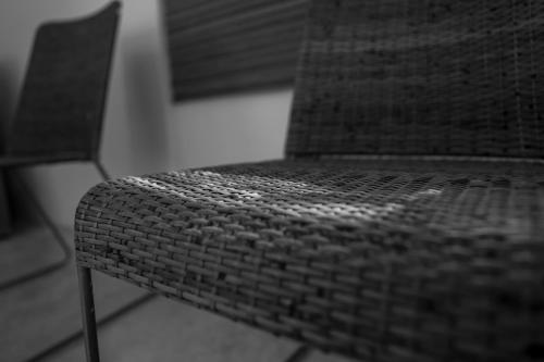a close up of a chair in a room at Villas H2O in Tulum