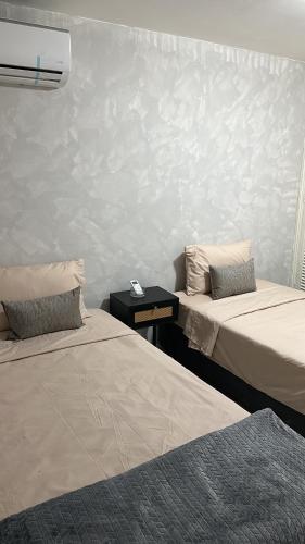 Ένα ή περισσότερα κρεβάτια σε δωμάτιο στο Apartamento 84 - 2 habitaciones