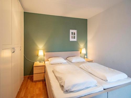 Postel nebo postele na pokoji v ubytování Apartment in Bergen near Sandy Beach
