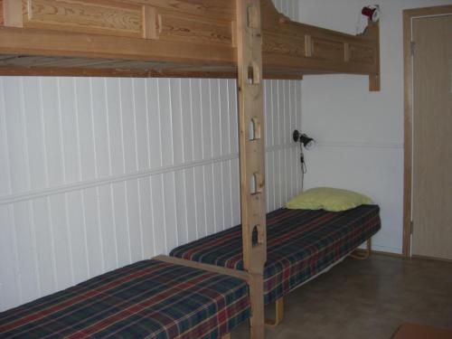 Een bed of bedden in een kamer bij IMI Stølen