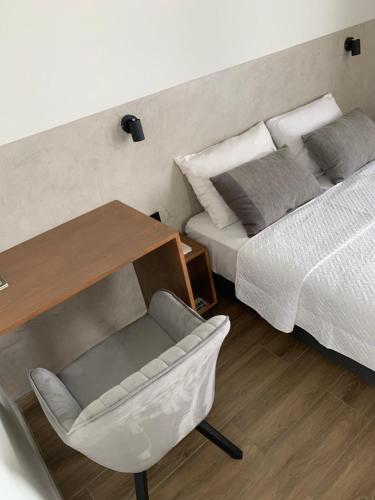 Una cama o camas en una habitación de Alfa-Rooms
