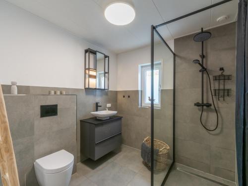 Ένα μπάνιο στο Bungalow in Callantsoog near the Beach