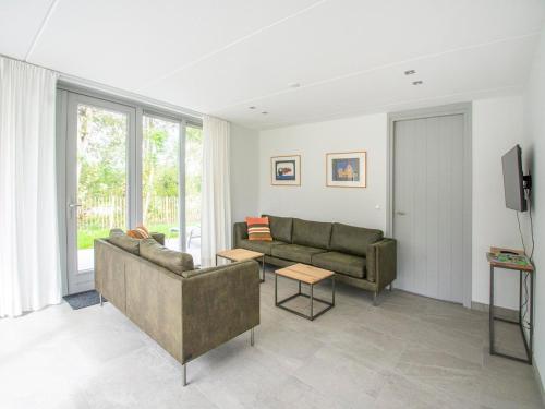 Posezení v ubytování Luxury holiday home by seaside and dunes