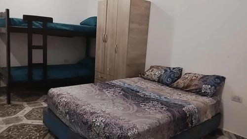 Ένα ή περισσότερα κρεβάτια σε δωμάτιο στο Hospedaje La Esperanza