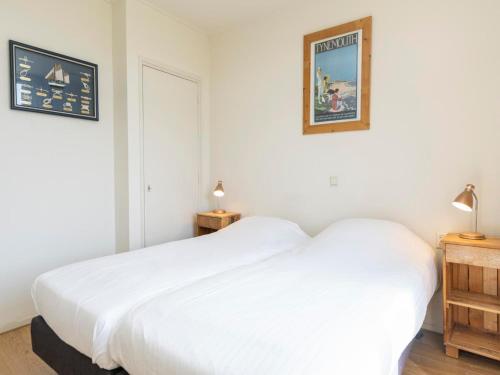 Ένα ή περισσότερα κρεβάτια σε δωμάτιο στο Apartment in De Koog near Texel Beach