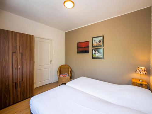 Ένα ή περισσότερα κρεβάτια σε δωμάτιο στο Apartment in De Koog near Texel Beach