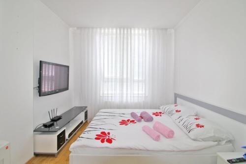 Postel nebo postele na pokoji v ubytování Apartman Slani San