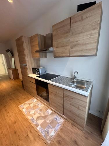 a kitchen with a sink and a counter top at Casa Harlock in Maser