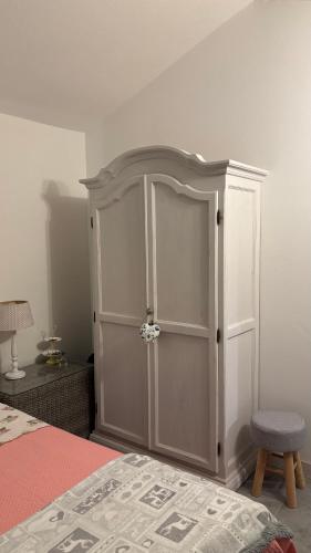 Ένα ή περισσότερα κρεβάτια σε δωμάτιο στο Oliveto Tuscany