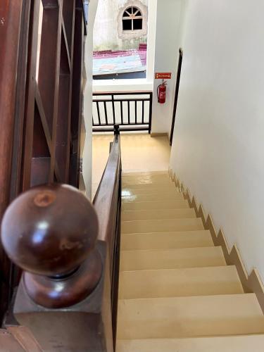 a stairway with a chocolate ball on top of it at Treasures of Zanzibar House in Zanzibar City
