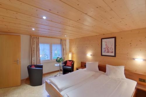 Postel nebo postele na pokoji v ubytování Hotel Frohe Aussicht