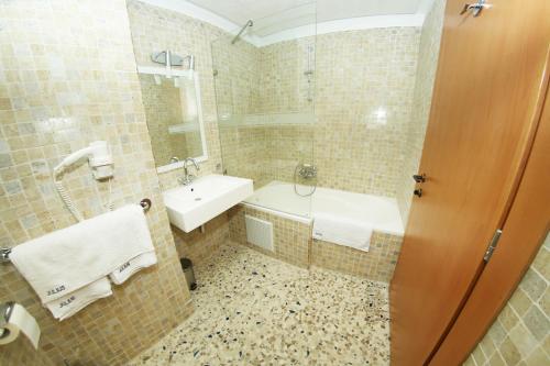 Koupelna v ubytování Hotel Julius